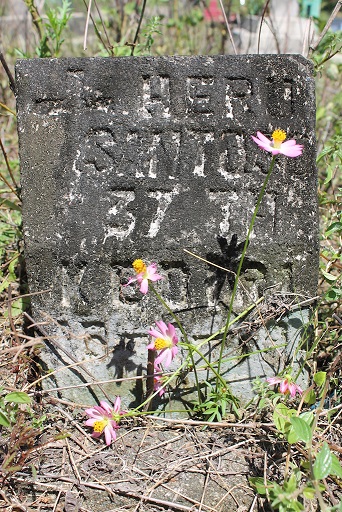A simple headstone marks the grave of Heru Susanto, a political prisoner. He was 37 when he died, only months before he was due to be released A simple headstone marks the grave of Heru Susanto, a political prisoner. He was 37 when he died, only months before he was due to be released